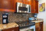 Custom cabinets, stainless steel appliances